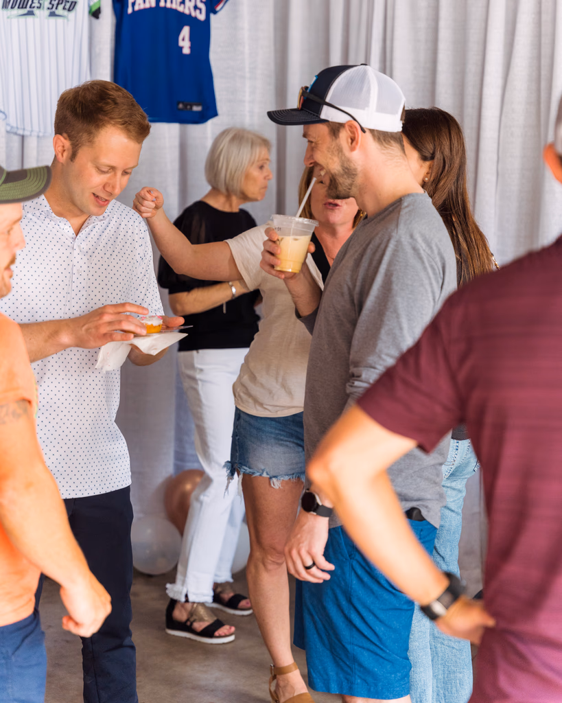 Guests gathering at the Gondolier Coffee cart during an outdoor Twin Cities event
