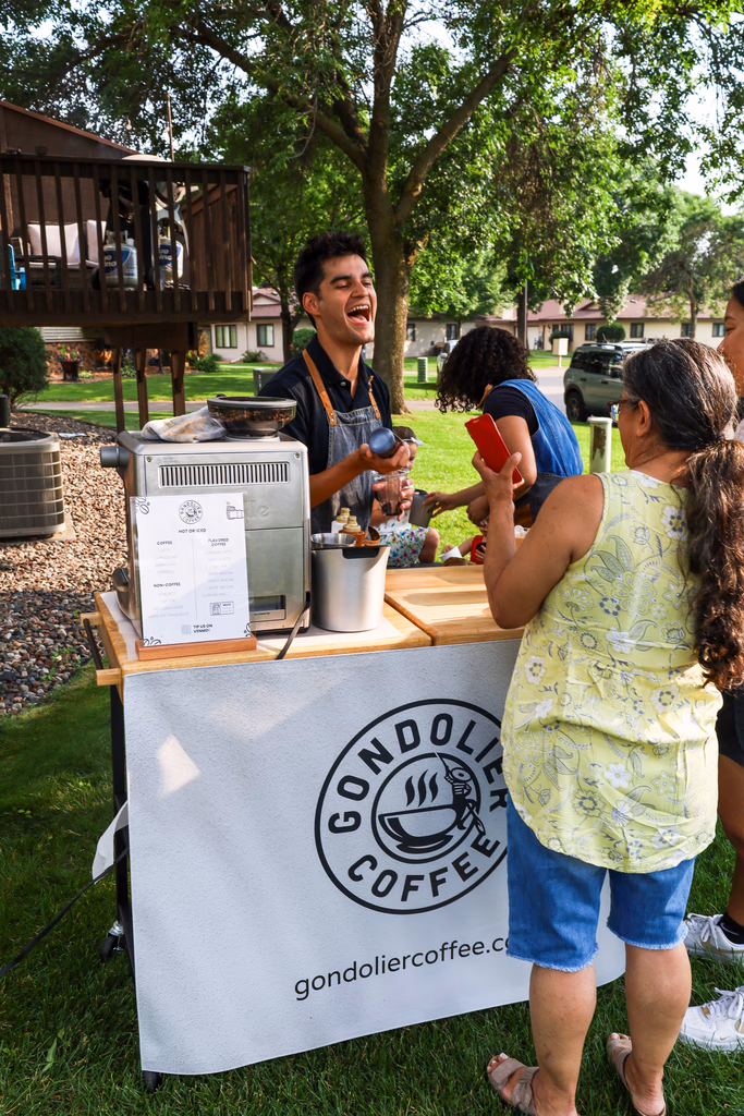 Gondolier Coffee cart serving a crowd of guests at an outdoor Minneapolis event
