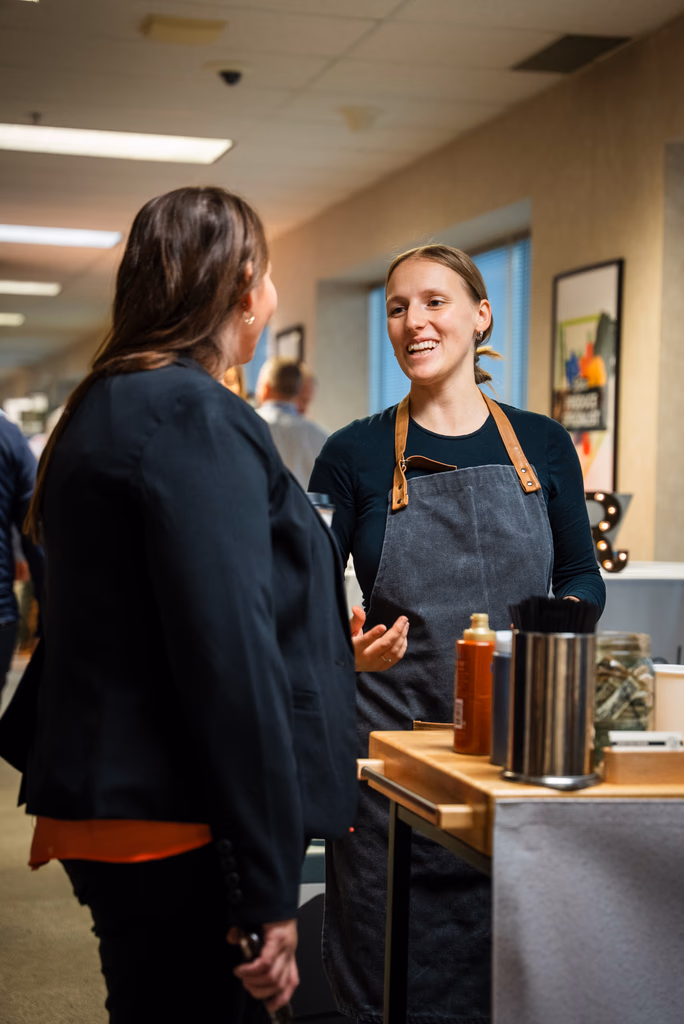 Guests enjoying the Gondolier Coffee experience at an indoor event