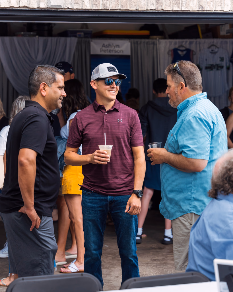 Guest being served coffee at an outdoor Twin Cities event