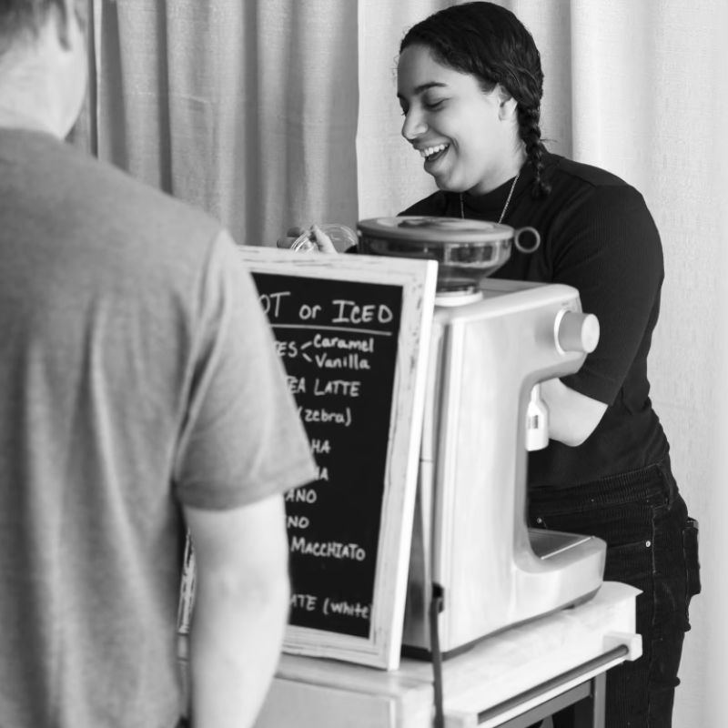 Barista pulling espresso at a Minneapolis mobile espresso bar